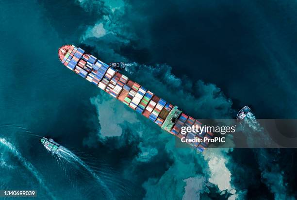 shipping by sea using containers to store and transport various goods. which is an important import and export business of thailand. water transport international. aerial view and top view. - distribution warehouse stockfoto's en -beelden