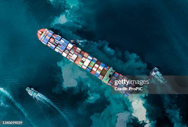 shipping by sea using containers to store and transport various goods. which is an important import and export business of thailand. water transport international. aerial view and top view. - shipping container top view - fotografias e filmes do acervo