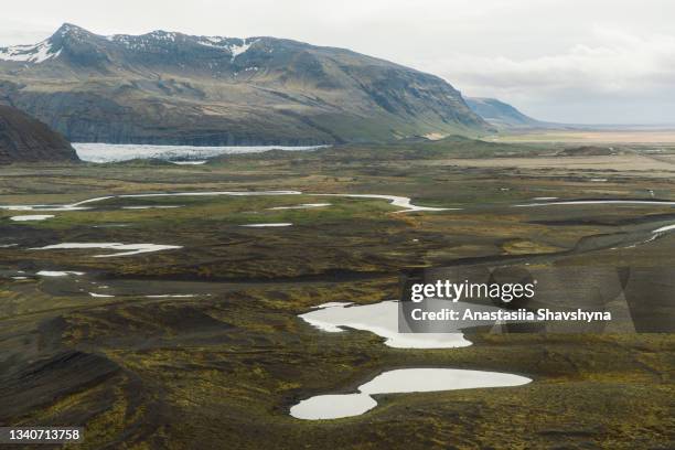 scenic aerial view of the mountain volcanic landscape in iceland summer - myrdalsjokull glacier stock pictures, royalty-free photos & images