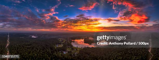 panoramic view of landscape against sky during sunset,gulfport,mississippi,united states,usa - gulfport stock pictures, royalty-free photos & images