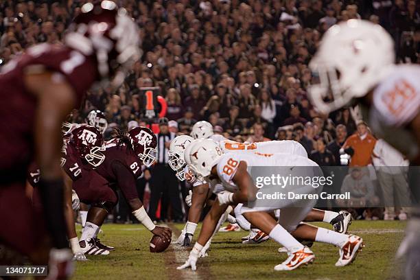 Patrick Lewis of the Texas A&M Aggies prepares to snap the ball against the Texas Longhorns in the second half of a game at Kyle Field on November...