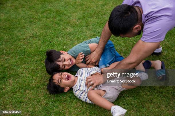 having fun with daddy - tickling stock pictures, royalty-free photos & images