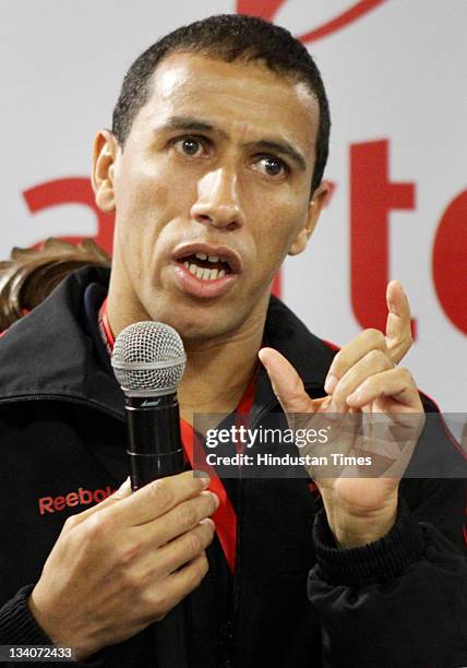 Former two time Marathon World Record Holder Khalid Khannouchi speaks during the Airtel Half Marathon press conference on November 24, 2011 in New...