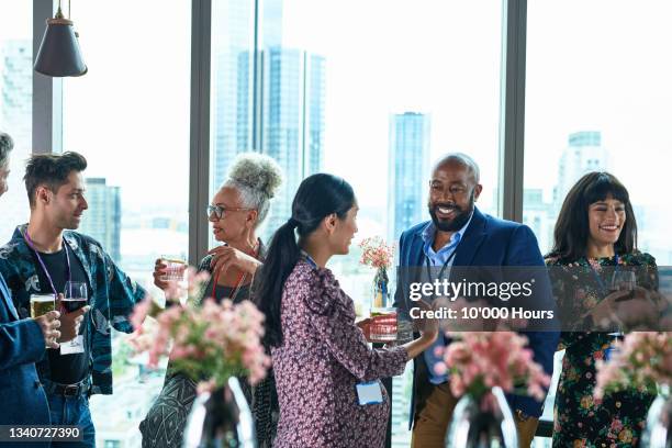 multi racial business colleagues enjoying after work drinks - happy hour foto e immagini stock