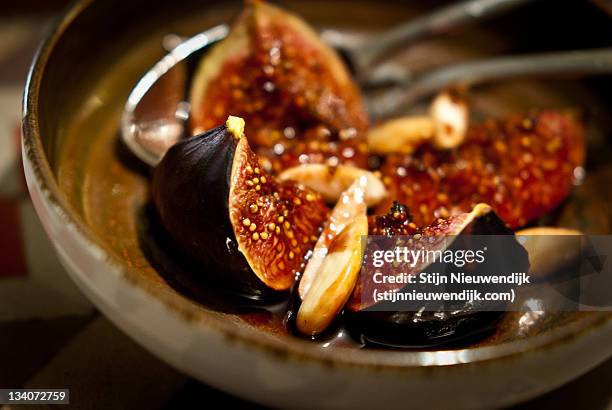 warm figs with almonds - nieuwendijk stock pictures, royalty-free photos & images
