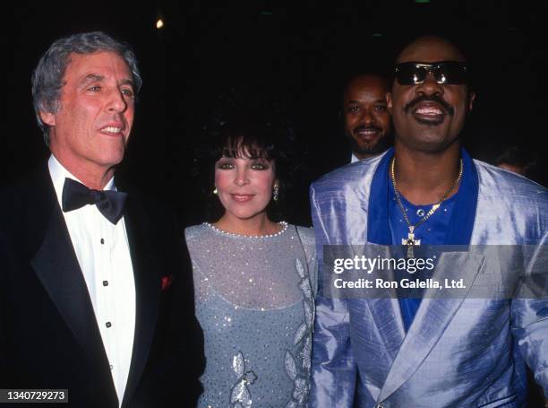 From left, married American couple, composer and musician Burt Bacharach & lyricist and singer Carole Bayer Sager, and Pop, R&B, and Jazz musician...