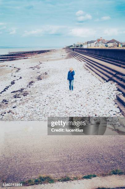 beach walk - silloth stock pictures, royalty-free photos & images