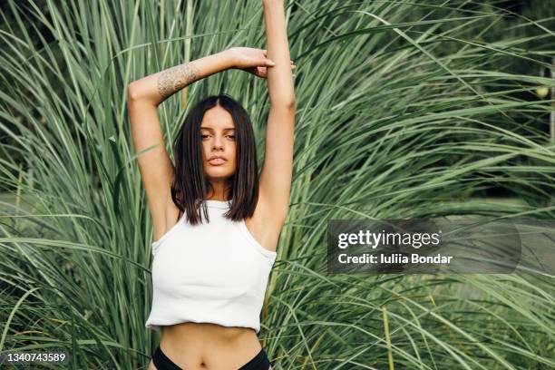 beautiful sexy lady over tropical background - woman green hair stock pictures, royalty-free photos & images