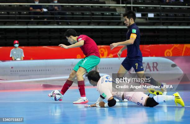 Youssef Jouad of Morocco scores their team's first goal past Katawut Hankampa of Thailand during the FIFA Futsal World Cup 2021 group C match between...