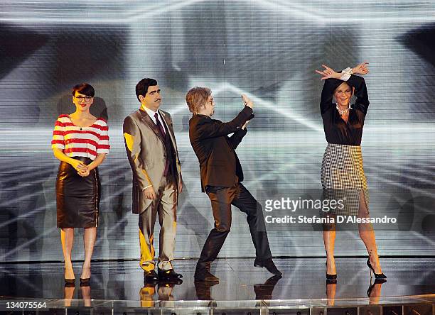 Arisa, Elio, Morgan and Simona Ventura attend X Factor Italian TV Show on November 24, 2011 in Milan, Italy.