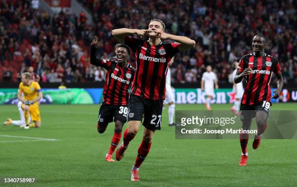 Florian Wirtz of Bayer 04 Leverkusen celebrates after scoring their side's second goal during the UEFA Europa League group G match between Bayer...