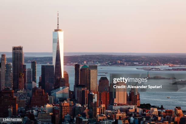 downtown manhattan skyline with one world trade center skyscraper on the left, aerial view, new york city - one world trade center fotografías e imágenes de stock