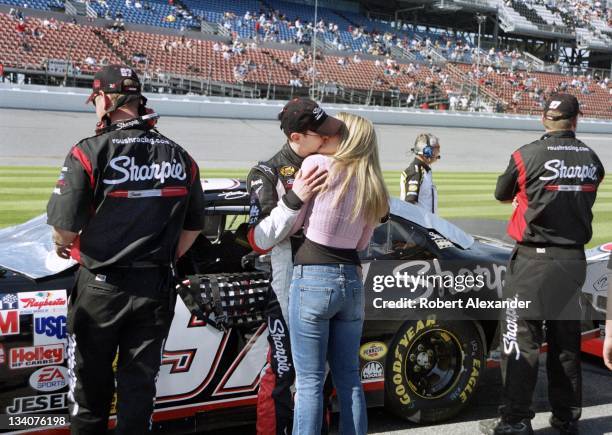 Driver Kurt Busch hugs his girlfriend Eva Bryan prior to making his 2005 Daytona 500 qualifying run at the Daytona International Speedway on February...