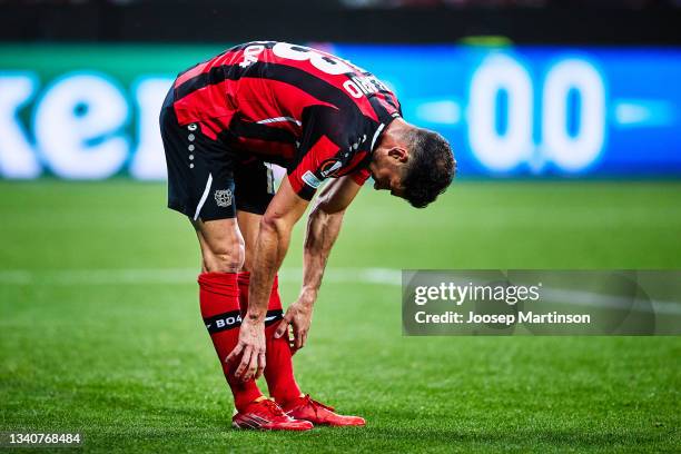 Lucas Alario of Bayer Leverkusen adjust his shinguards during the UEFA Europa League group G match between Bayer Leverkusen and Ferencvarosi TC at...