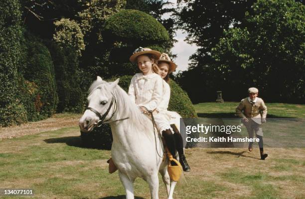Georgina Armstrong, Gemma Paternoster and Anthony Walters as the Gordon children in a scene from the film 'Black Beauty', 1994.