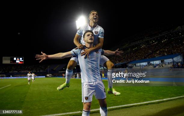 Declan Rice of West Ham United celebrates with Manuel Lanzini after scoring their side's second goal during the UEFA Europa League group H match...