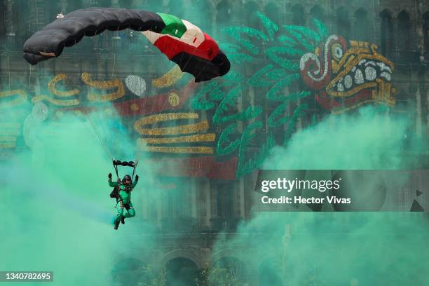 Military paratrooper performs a demonstration during the annual shout of independence as part of the independence day celebrations on September 16,...