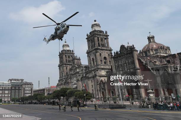 Helicopter of the Mexican Air Force performs a demonstration during the annual military parade as part of the independence day celebrations on...