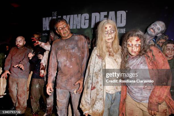 Zombies attend the photocall of the final season of "The Walking Dead" on September 16, 2021 in Milan, Italy.