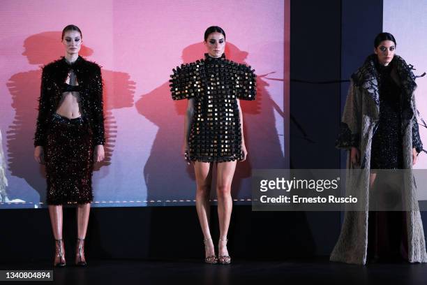 Models walk on the stage of "Roma è di Moda" show at Piazza Augusto imperatore on September 16, 2021 in Rome, Italy.