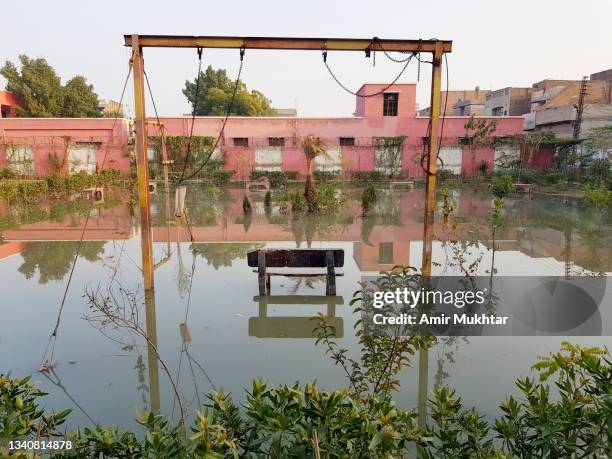 rain or flood water inside the public park after heavy rain. - pakistan ストックフォトと画像