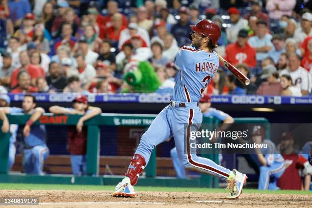 Bryce Harper of the Philadelphia Phillies his a three run home run during the seventh inning against the Chicago Cubs at Citizens Bank Park on...