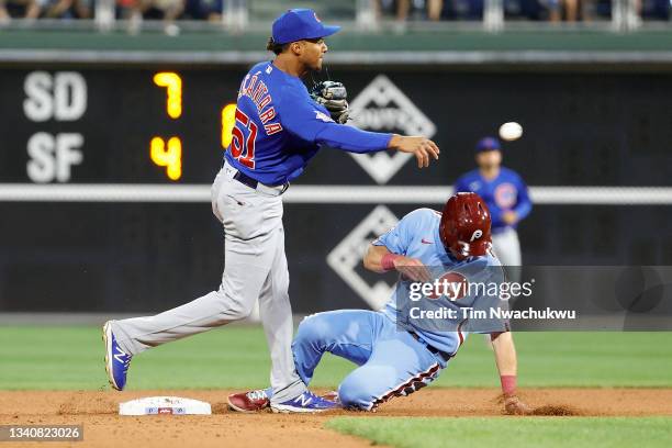 Sergio Alcantara of the Chicago Cubs forces out Andrew Knapp of the Philadelphia Phillies during the eighth inning at Citizens Bank Park on September...