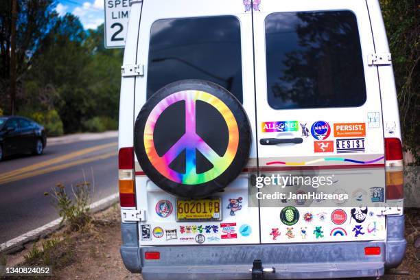 santa fe, nm: van covered with progressive bumper stickers - bumper sticker stock pictures, royalty-free photos & images