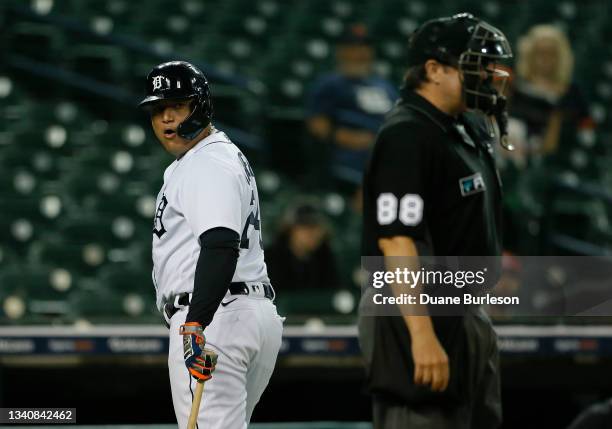 Miguel Cabrera of the Detroit Tigers has words with home plate umpire umpire Doug Eddings after a called third strike during the seventh inning at...