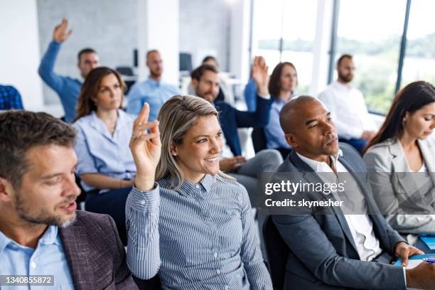 engaging seminar in board room! - questions and answers stock pictures, royalty-free photos & images