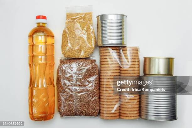 food products  in packages on white background. - conditionnement photos et images de collection