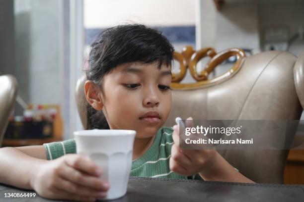 asian kid girl patient don't want to eat medicine pills for health and illness concept. - paracetamol stock pictures, royalty-free photos & images