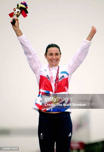 Gold medalist Sarah Storey of Team Great Britain celebrates on the podium at the medal ceremony for the Cycling Road Women's C4-5 Road Race on day 9...