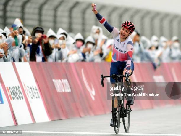 Sarah Storey of Team Great Britain celebrates winning the gold medal after competing in the Cycling Road Women's C4-5 Road Race on day 9 of the Tokyo...