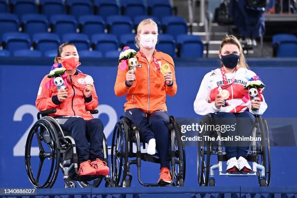 Silver medalist Yui Kamiji of Team Japan, gold medalist de Diede de Groot of Team Netherlands and bronze medalist Jordanne Whiley of Team Great...