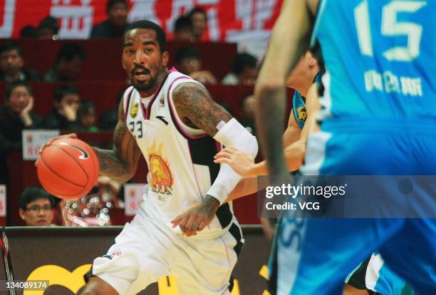 Smith of Zhejiang Chouzhou controls the ball during the third round of the CBA 11/12 game against Fujian Xunxing at Meihu Stadium on November 25,...