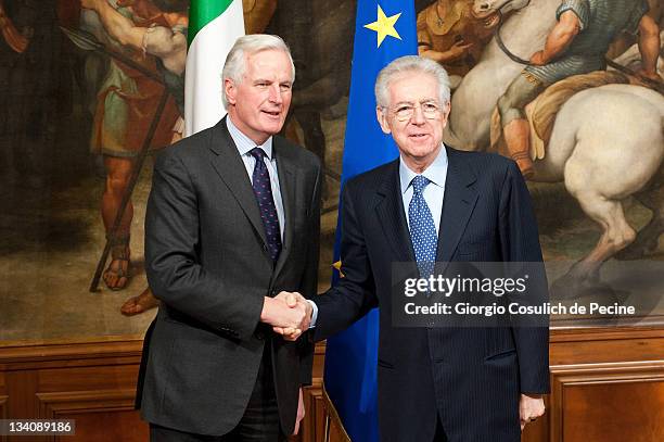 European Union Internal Market Commissioner Michel Barnier meets Italian Prime Minister Mario Monti at Palazzo Chigi on November 25, 2011 in Rome,...