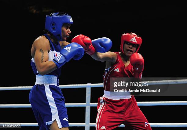 Natasha Jonas of Great Britain punches Quanitta Underwood of USA during their quaterfinal, 57kg-60kg bout at ExCel on November 25, 2011 in London,...