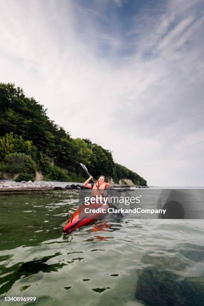 sea kayaking in the baltic sea - sea kayaking imagens e fotografias de stock