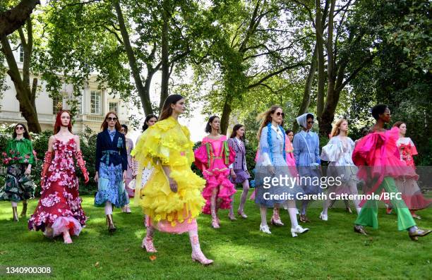 Models walk the runway at the Bora Aksu show during London Fashion Week September 2021 on September 17, 2021 in London, England.