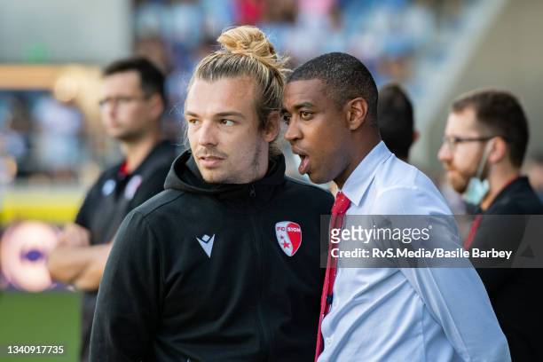 Gelson Fernandes, Vice President of FC Sion talks with Barthelemy Constantin, Sports Director of FC Sion before the Super League match between FC...