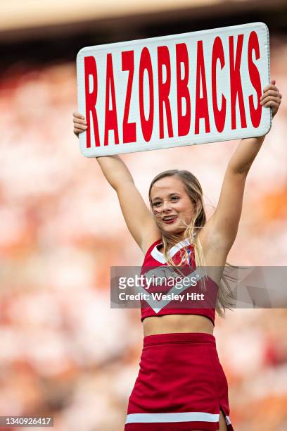 Cheerleader of the Arkansas Razorbacks performs during a game against the Texas Longhorns at Donald W. Reynolds Stadium on September 11, 2021 in...