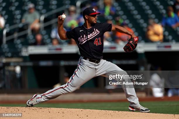 Joe Ross of the Washington Nationals pitches during the second inning against the New York Mets at Citi Field on August 11, 2021 in New York City....