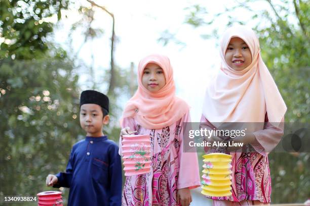 multiculturalism - malay songkok stock pictures, royalty-free photos & images