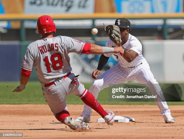 Tim Anderson of the Chicago White Sox takes the throw to stop Jose Rojas of the Los Angeles Angels from stealing second base at Guaranteed Rate Field...