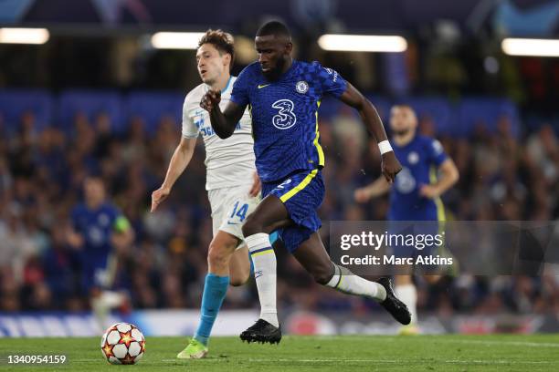 Antonio Rudiger of Chelsea in action with Daler Kuzyaev of Zenit Saint Petersburg during the UEFA Champions League group H match between Chelsea FC...