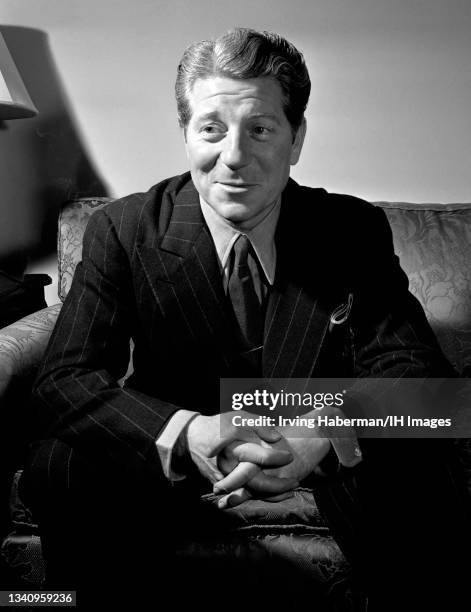 French actor and singer Jean Gabin sits on the couch circa March, 1941 in New York, New York. Gabin was considered a key figure in French cinema.