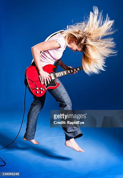 girl power - red electric guitar stock pictures, royalty-free photos & images