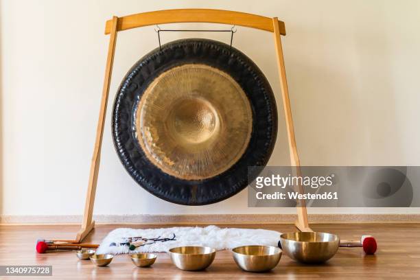 percussion instruments in studio - rin gong stock pictures, royalty-free photos & images