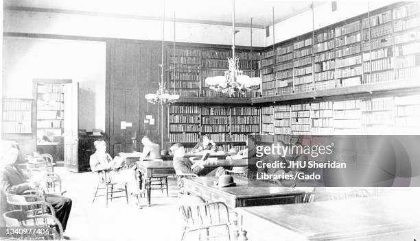 At the library inside Hopkins Hall at the downtown Old Campus of Johns Hopkins University, a dozen male students, along with Professor of Classics,...